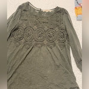 Green top with decorative lace